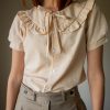 The nude colored ruffle collar blouse - Size 34 up to 36