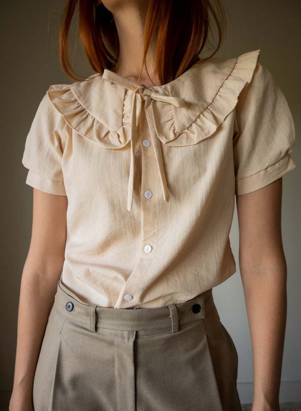 The nude colored ruffle collar blouse - Size 34 up to 36