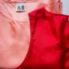 The soft pink and red silk singlet set