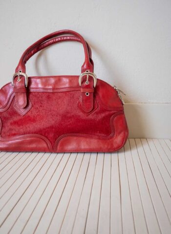 The leather bright red bag
