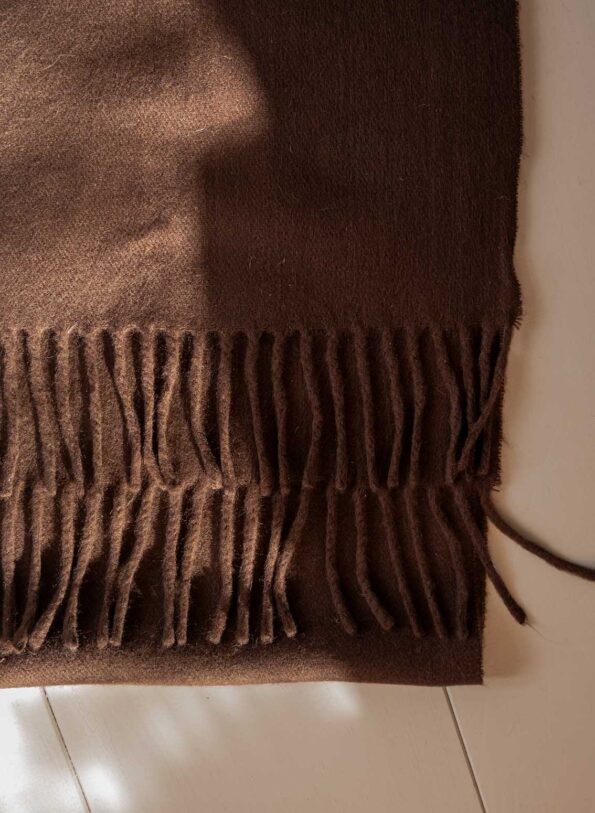 The 100% wool dark brown scarf