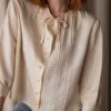 The cream pintuck bow blouse in silk - Size up to 36