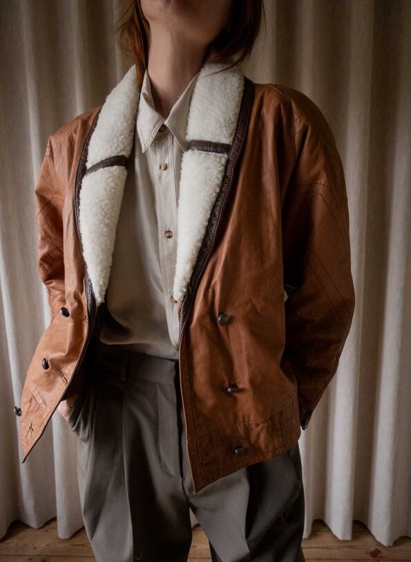 The padded leather jacket with pile collar - Size up to 40