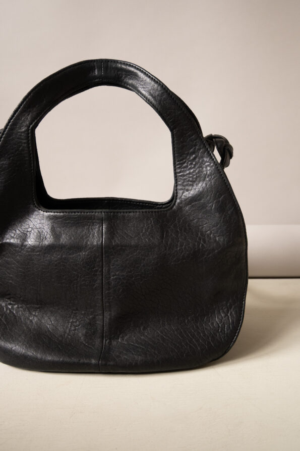 The rounded leather bag